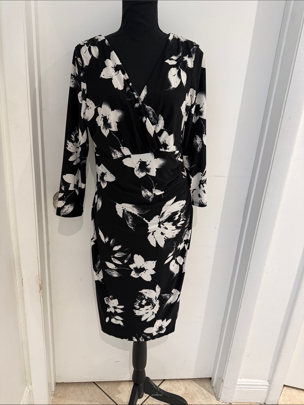 Catherine Malandrino Black Wrap Dress with White Flowers. Fits beautifully.